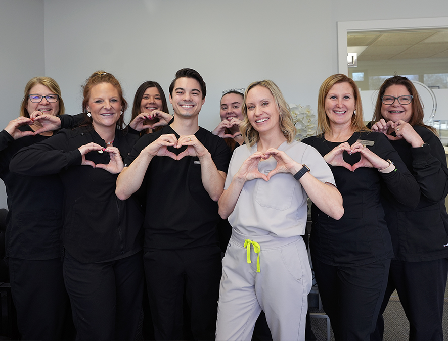 Union Smiles Dentitsts doing Heart Hands