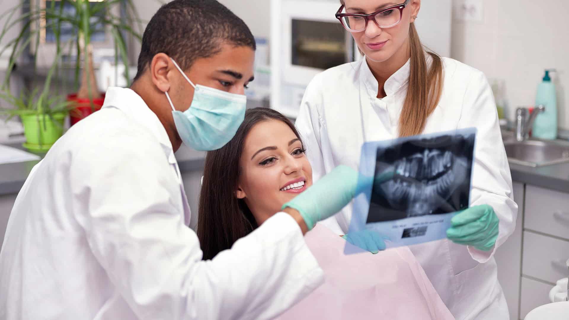 Dentists Discussing Dental Implant Options